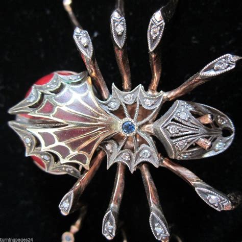 faberge black widow brooch fake